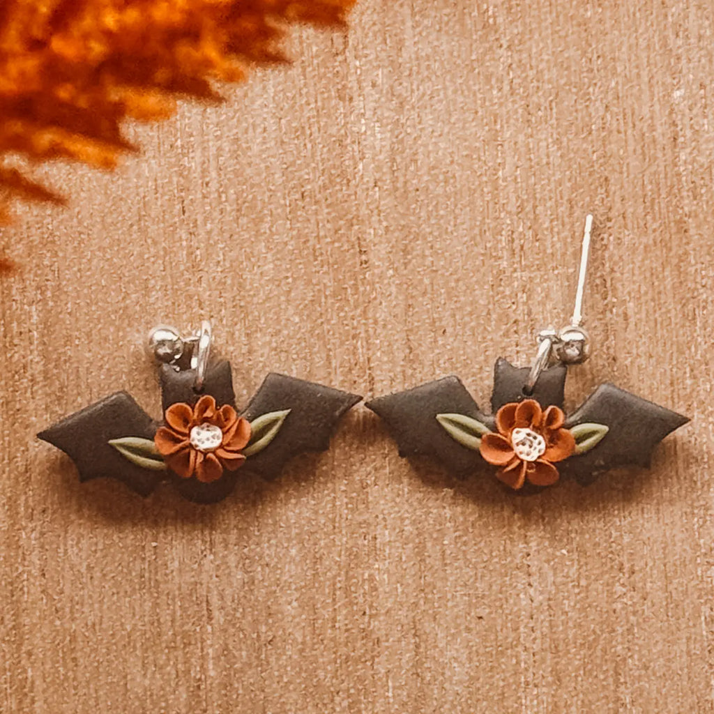 Bat Earrings with Orange Floral Accent