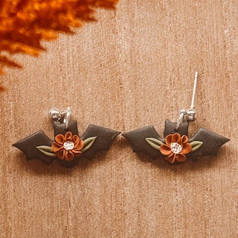 Bat Earrings with Orange Floral Accent
